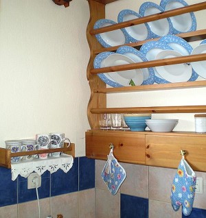 old style shelves for the dishes and cups